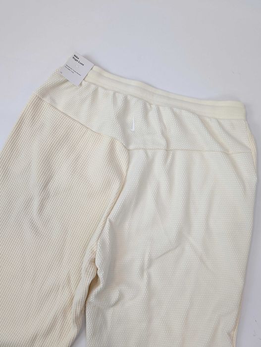 Spodnie Dresowe Nike Yoga Luxe Joggery Waflowe Bawełna nowe z Metką L Ecru