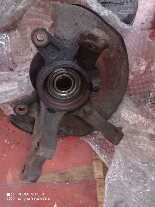 поворотний кулак в збори передній лівий Chery Tiggo T 11 б/у