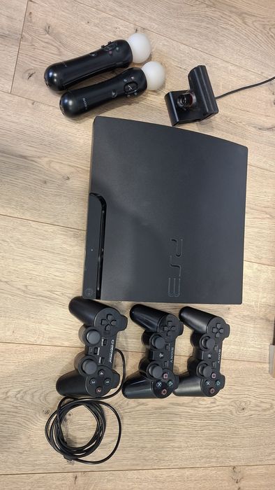 PlayStation 3 Slim (model CECH-3004B) + move + gry