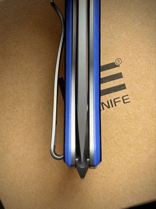 Нож WE Knife Press Check Flipper Elishewitz Titanium Blue G10 CPM-20CV