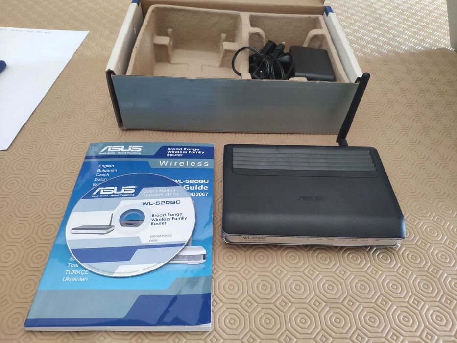 ASUS WL-520 GC Wireless Router (Never Used)64283902645763121