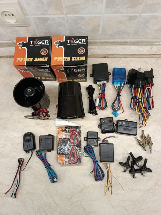 Комплект центрального замка . Сигнализация . Комплектующие.