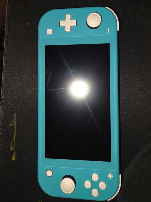 Nintendo Switch Lite (com capa e bolsa)