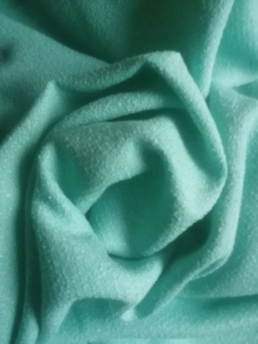 Тканина костюмна, бірюза (дрібне буклє).