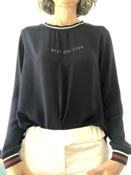 Blusa acetinada Springfield