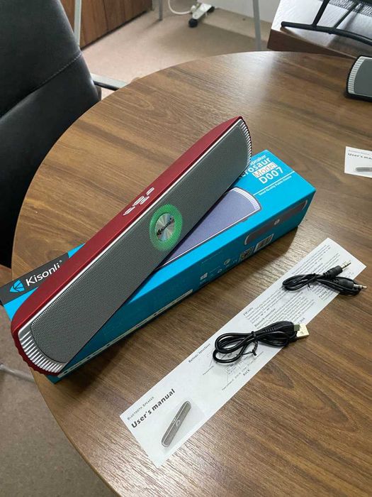 Колонка портативна Kisonli з радіо,  підсвіткою та Bluetooth нова