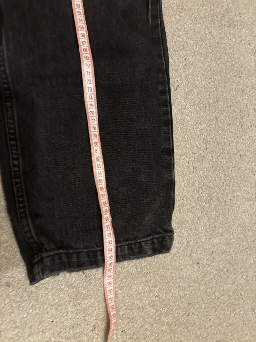Reserved Czarne baggy jeans z dziurami rozm 28