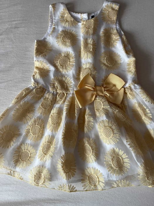 elegancka żółta  sukieneczka z kokardą