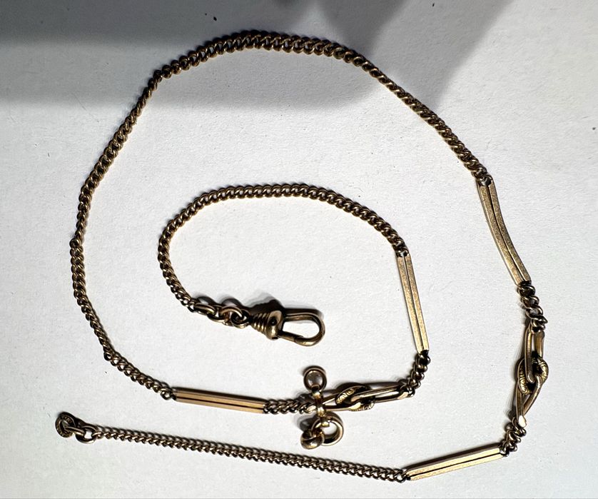 Antigas correntes de relógios de bolso em metal dourado