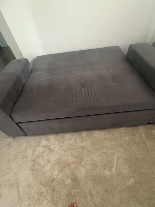 Sofa cama em tecido cinzento