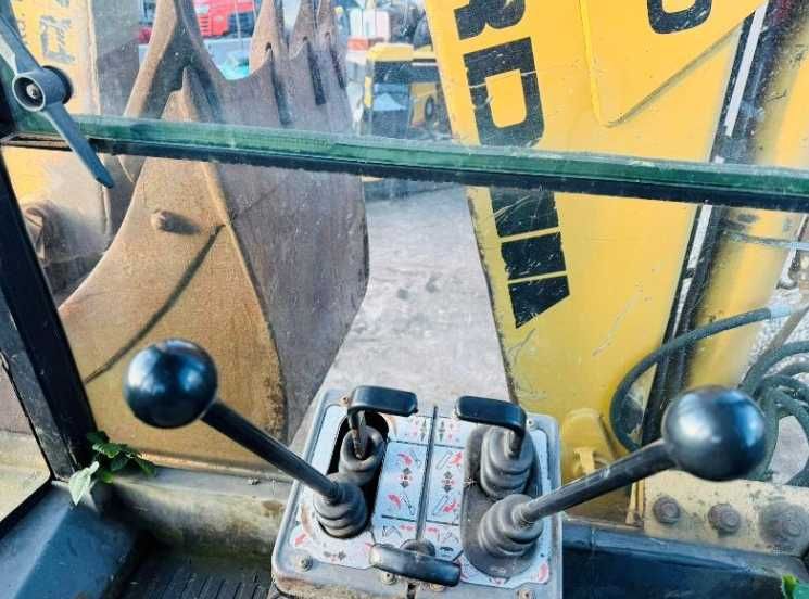 Екскаватор - навантажувач NEW HOLLAND (JCB 3CX)