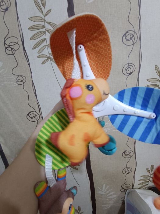 Іграшка на коляску