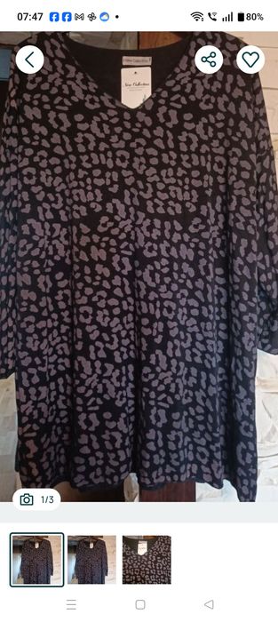 Piękny nowy sweterek z printem zwierzęcym