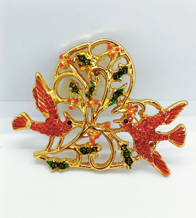 Śliczna broszka ptaki