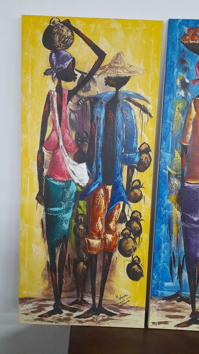 Quatro quadros pintados a mão