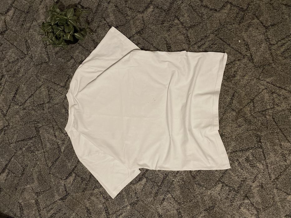 Stylowa biała koszulka oversize rozmiar L marki Lacoste