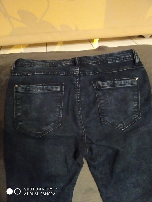 spodnie jeansyReserved 38