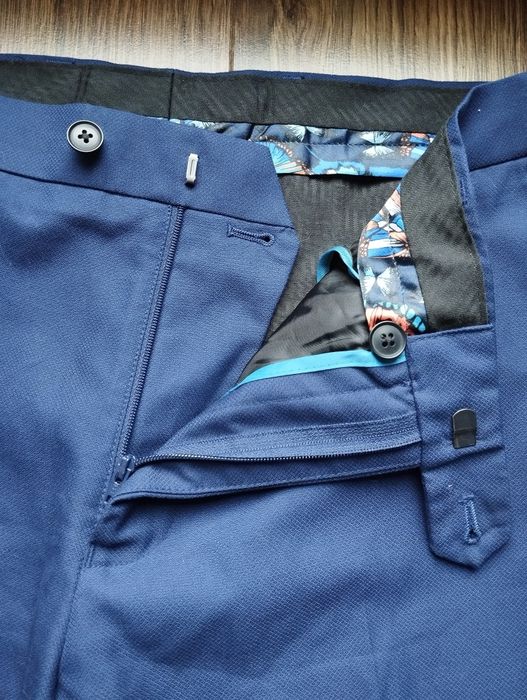 Lekkie eleganckie spodnie w kant slim fit rozm S