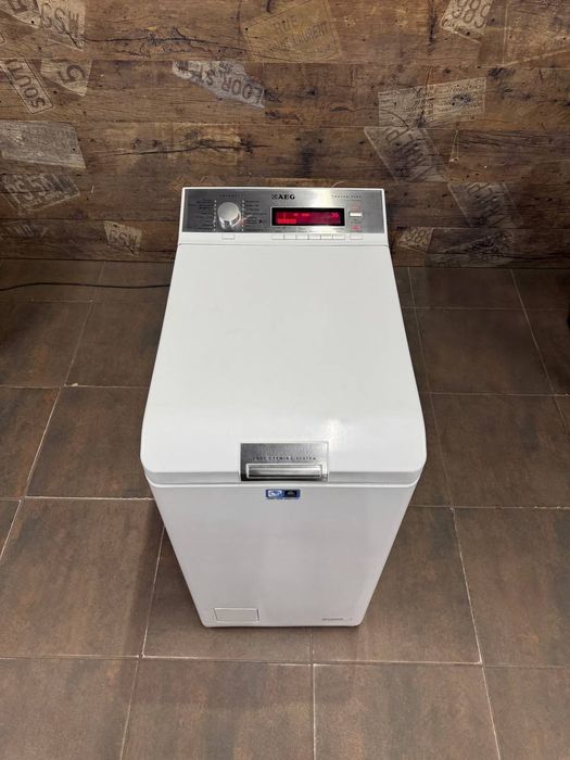 Вертикальна пральна/стиральная машина Whirlpool AWE 7515/1