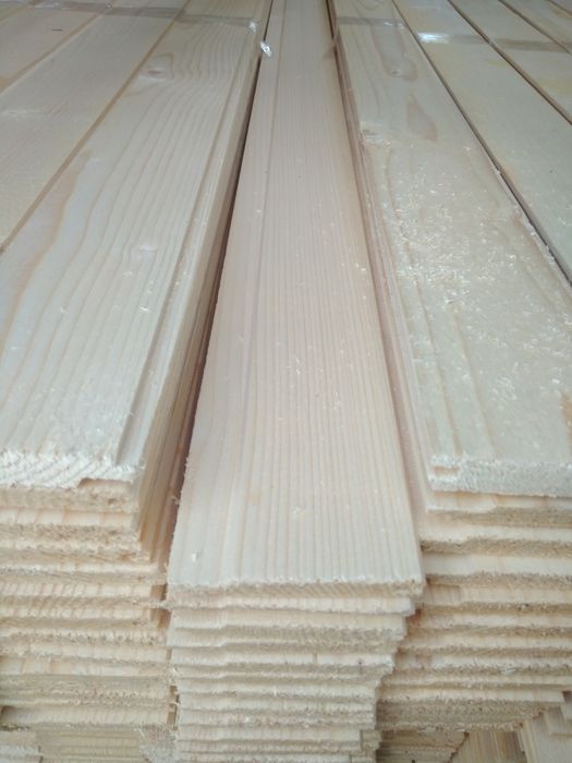 Дерев'яна підлога, імітація бруса та дерев'яна вагонка. Є: "ОПТ"