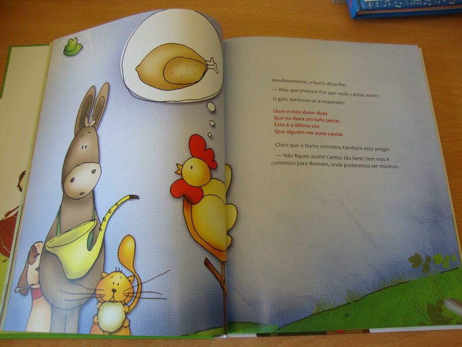 Livros histórias, dicionário de música e livro de desenhar