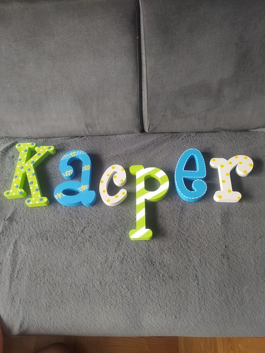Literki, imię Kacper.