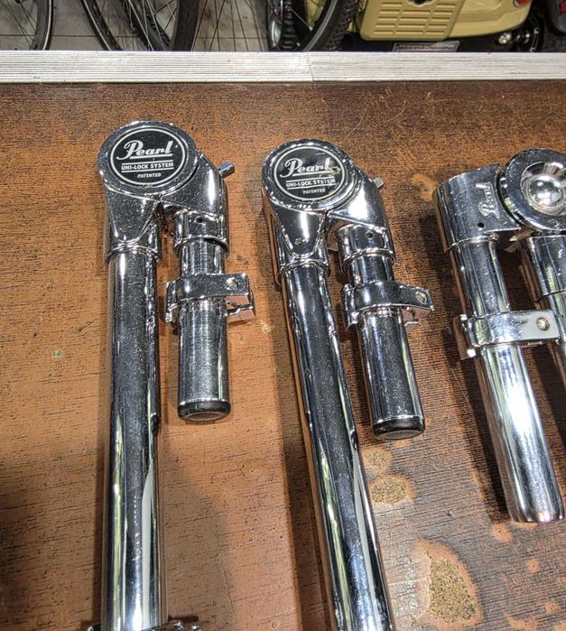 Holdery Pearl unlock system do perkusji