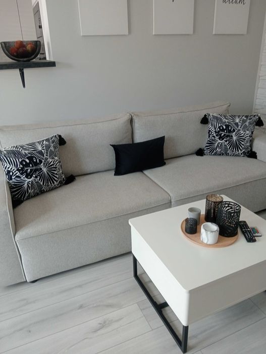 Siwa sofa rozkładana z funkcją spania