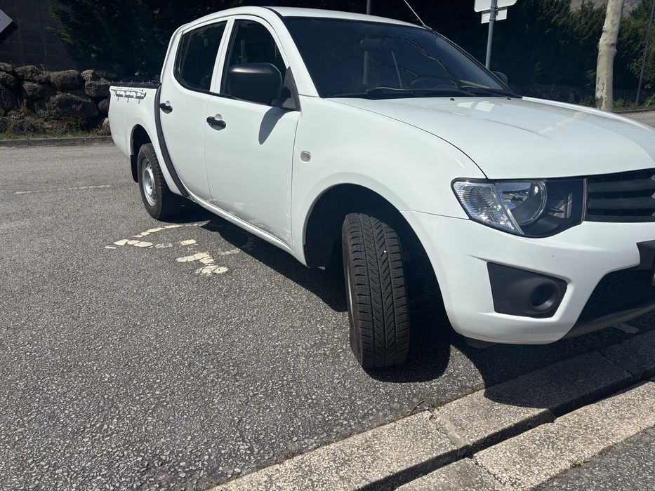 Mitsubishi L200  …..