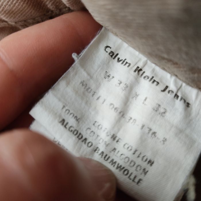 Spodnie męskie w kolorze beżowym