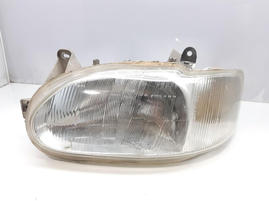 Farol Esquerdo Ford Escort