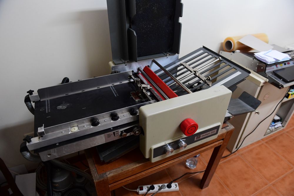 Maquina de dobrar papel