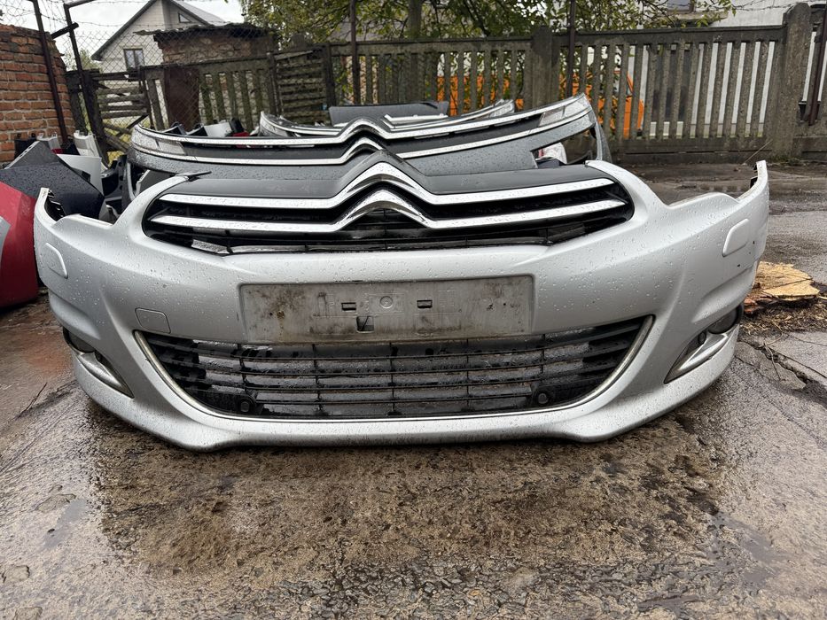 Бампер перід Сітроен С4 Citroen C4B7 ексклюзив з омивачами фар 2016