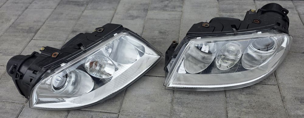 Reflektory Lampy Bi-Xenon Passat b5 fl P+L Hella EU
