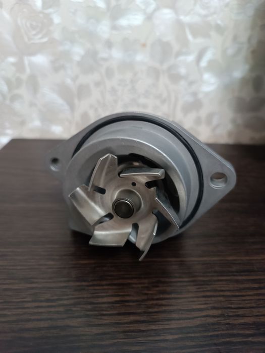 Помпа VAG / водяний насос VW Caddy 1.4