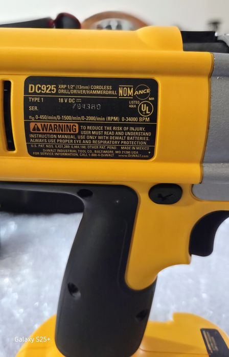 DeWalt Hammer drill DC 925 with charger, battery, and handheld stick