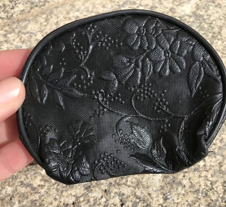 Pequena bolsa de moedas