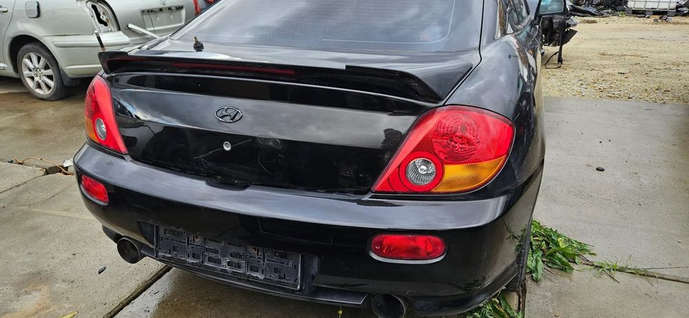 Klapa tylna bagażnika Hyundai Coupe II 2003r lak. EB