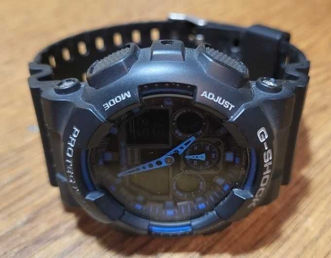Casio G-Shock GA 100-1A2ER
Black/ Blue как новые