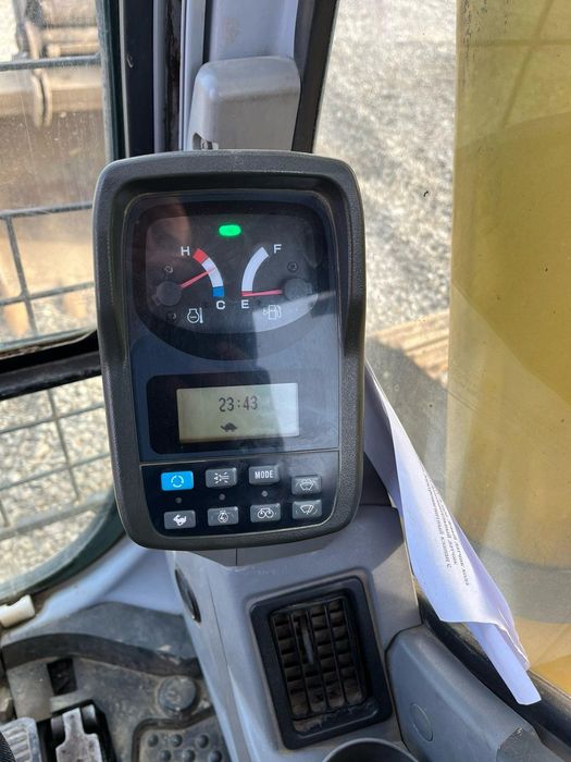 Екскаватор new holland