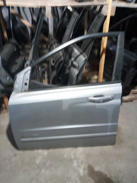 Двері Ssang Yong Rexton Actyon Kyron