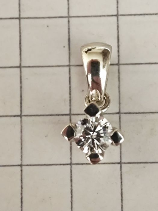 Золотий кулон, з діамантом 0.210ct, 750 проба.