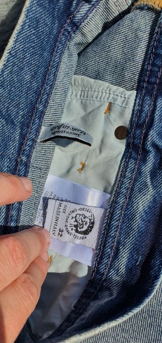 Spodnie jeans jeansowe Diesel oryginalne z dziurami Rozmiar 32
