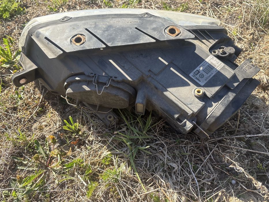 Lampy przód bi xenon skrętny passat b6