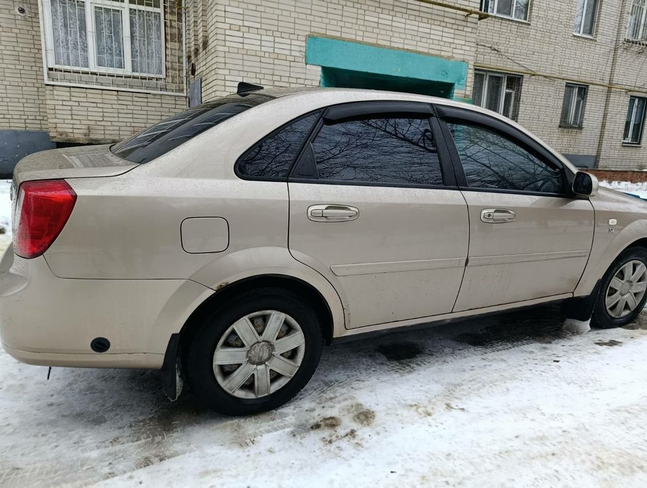 Шевроле  Лачети 1.8