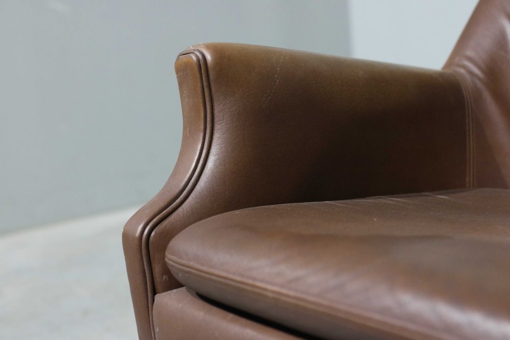 Poltrona vintage em couro | Design Nórdico | Mobiliário Vintage