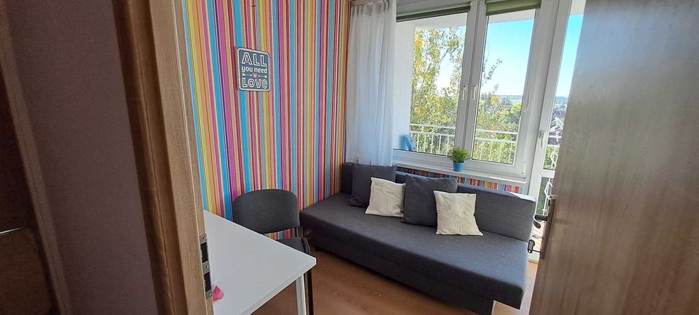 Pokój z balkonem na Trynku