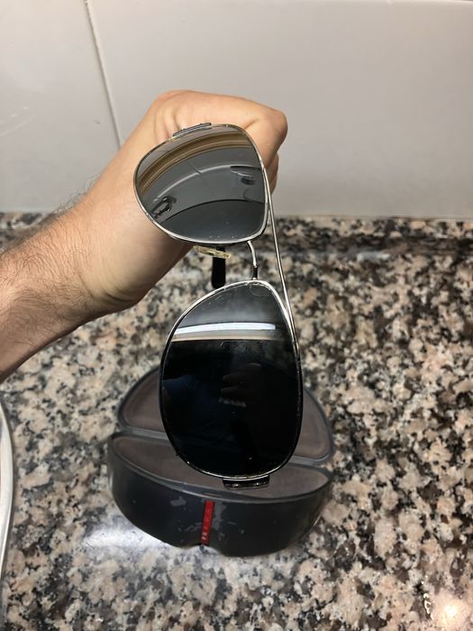 Óculos escuros Prada
