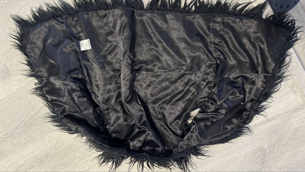 Хутряний жилет.