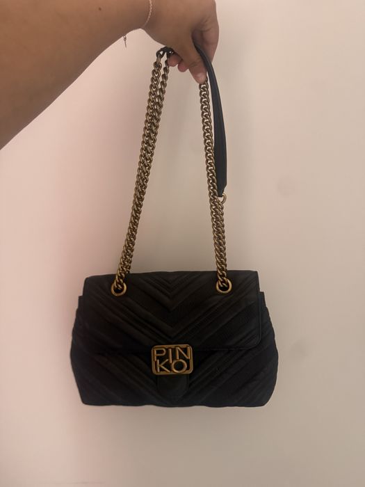 Mala preta da pinko em bom estado